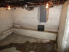 Dirty Leaky Wet Basement Before