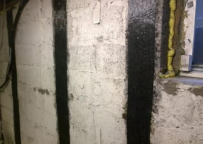 Strengthening Garrison, KY Basement Wall with Carbon Fiber Supports